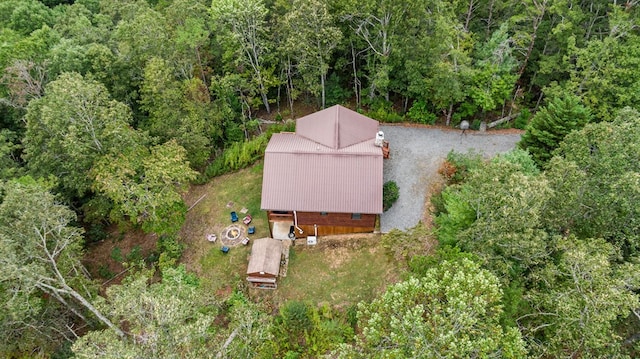 drone / aerial view with a view of trees