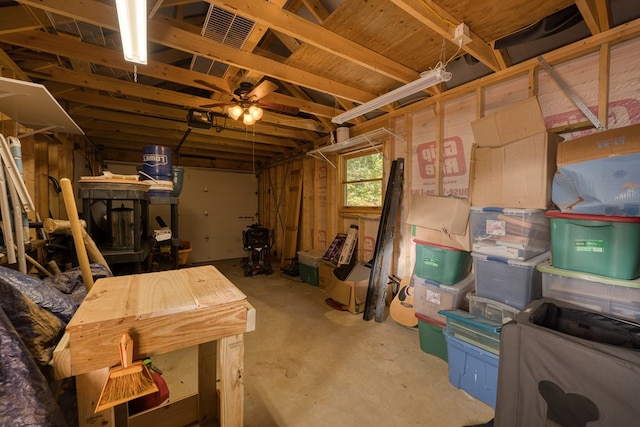 basement with ceiling fan