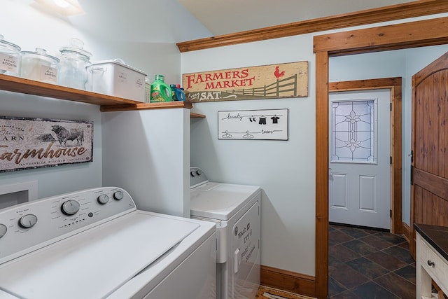 45 Bent Grass Cir, Hayesville, NC 28904 - laundry area featuring washing machine and clothes dryer, dark stone finish flooring, and baseboards