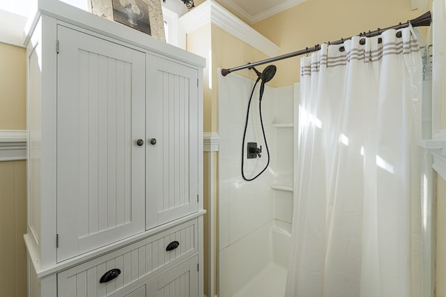 bathroom with walk in shower and crown molding