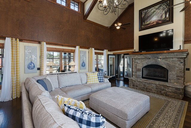 45 Bent Grass Cir, Hayesville, NC 28904 - living room featuring high vaulted ceiling, hardwood / wood-style floors, plenty of natural light, a chandelier, and a stone fireplace