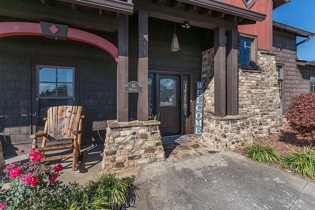 45 Bent Grass Cir, Hayesville, NC 28904 - view of exterior entry with a porch and stone siding