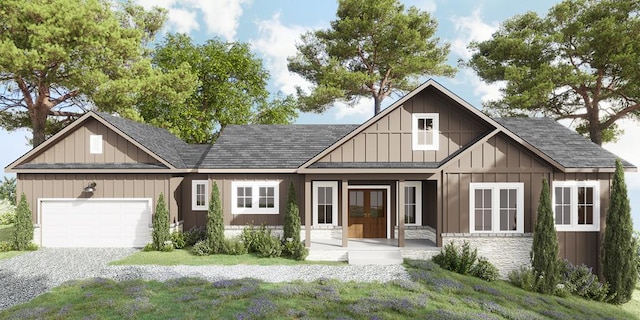 view of front facade featuring french doors, a garage, and a front lawn