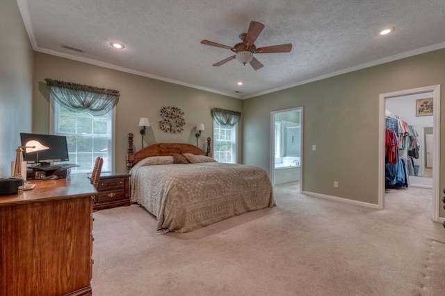 bedroom featuring visible vents, recessed lighting, light carpet, and ornamental molding