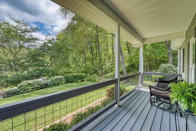wooden terrace with a porch