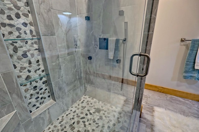 full bath with a shower stall