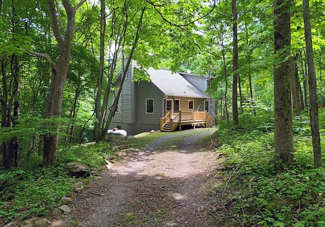 view of yard featuring a wooden deck