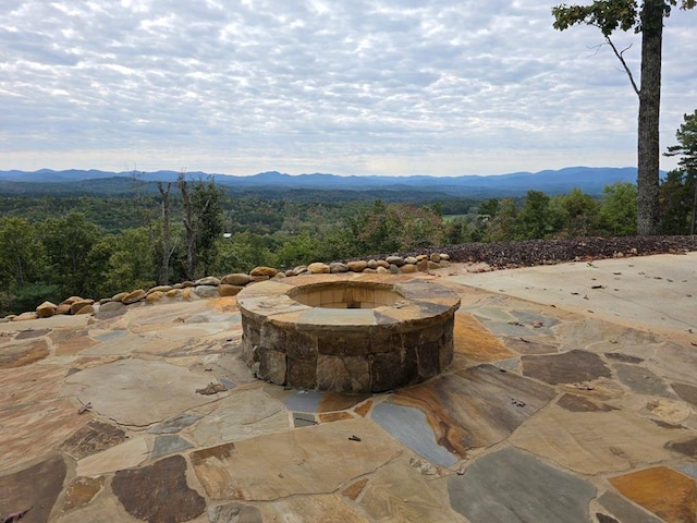 view of patio / terrace featuring a mountain view