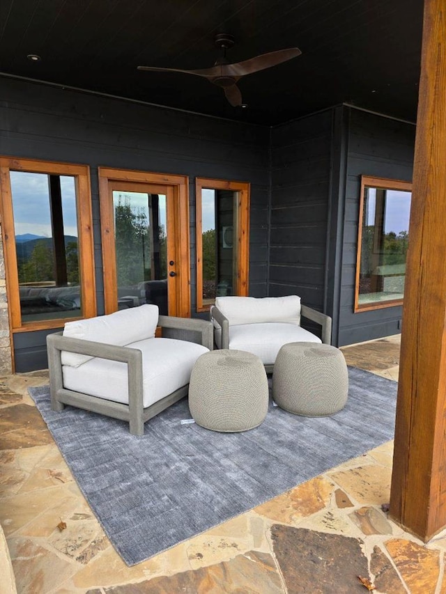 view of patio featuring ceiling fan