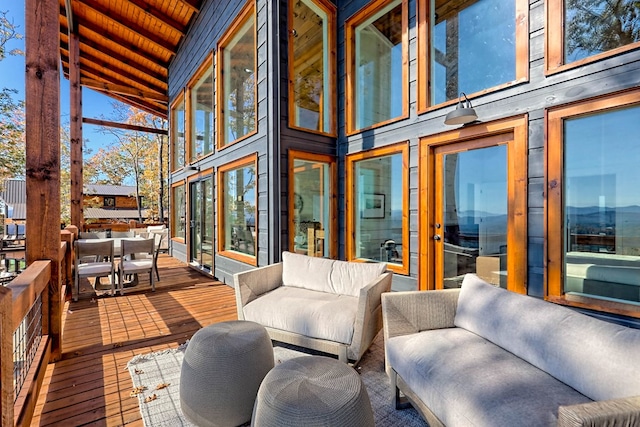 exterior space featuring outdoor dining space and an outdoor living space