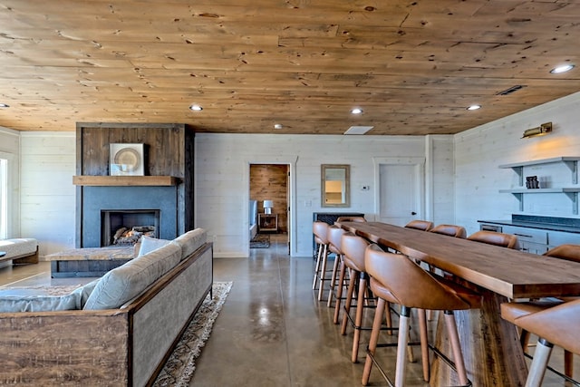 dining area featuring wooden ceiling