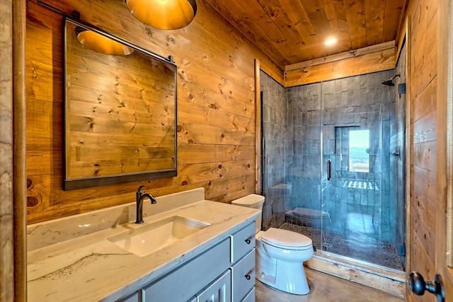 bathroom with vanity, toilet, wooden walls, and an enclosed shower