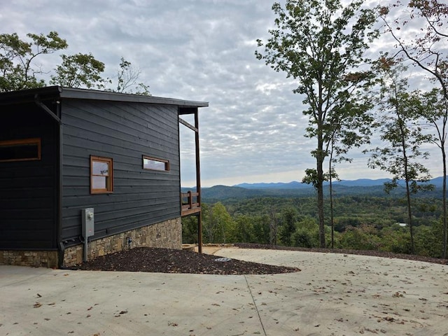 view of home's exterior with a mountain view