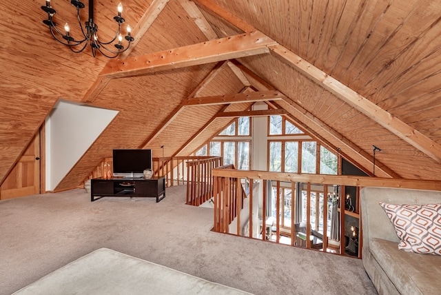 interior space featuring lofted ceiling with beams, carpet, a chandelier, and wood ceiling