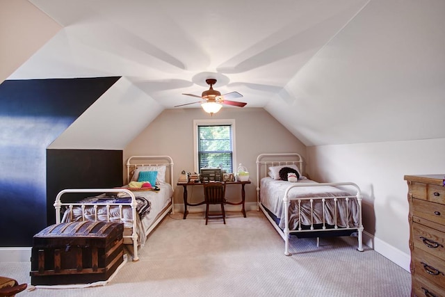 bedroom with carpet flooring, ceiling fan, and lofted ceiling