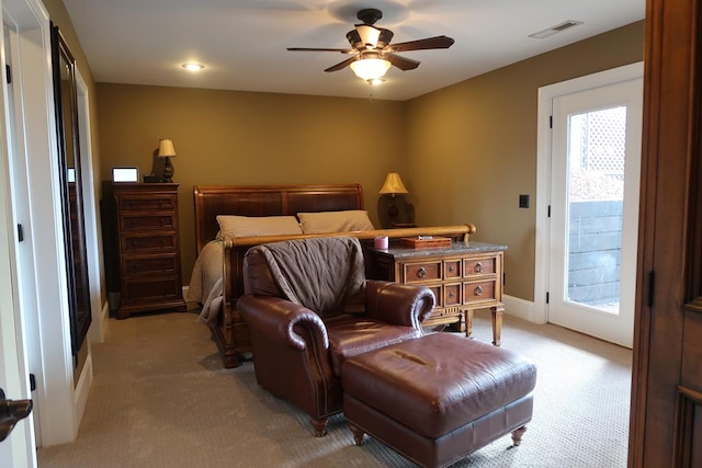 bedroom featuring access to outside, ceiling fan, and light colored carpet