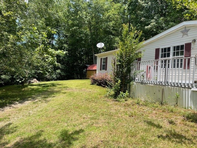 view of yard with a deck