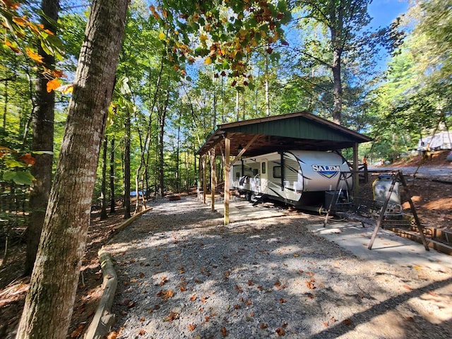 view of yard with a carport