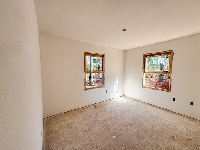 spare room with plenty of natural light