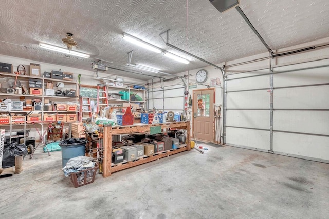 645 E Double Knob Dr, Hayesville, NC 28904 - garage featuring a garage door opener