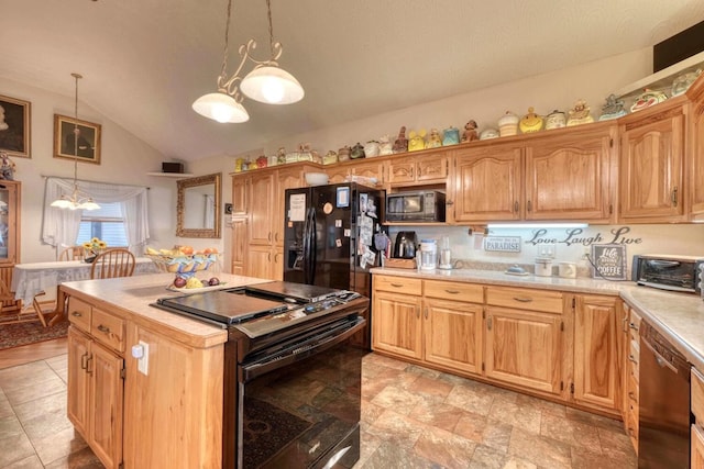 645 E Double Knob Dr, Hayesville, NC 28904 - kitchen featuring black appliances, a chandelier, vaulted ceiling, light countertops, and a kitchen island