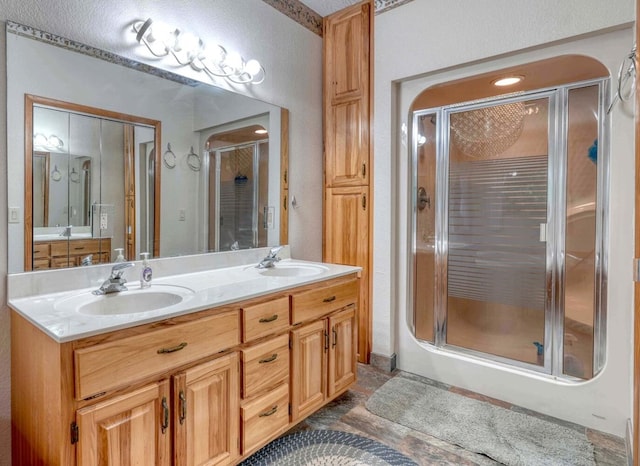 645 E Double Knob Dr, Hayesville, NC 28904 - full bath featuring a stall shower, double vanity, and a textured wall