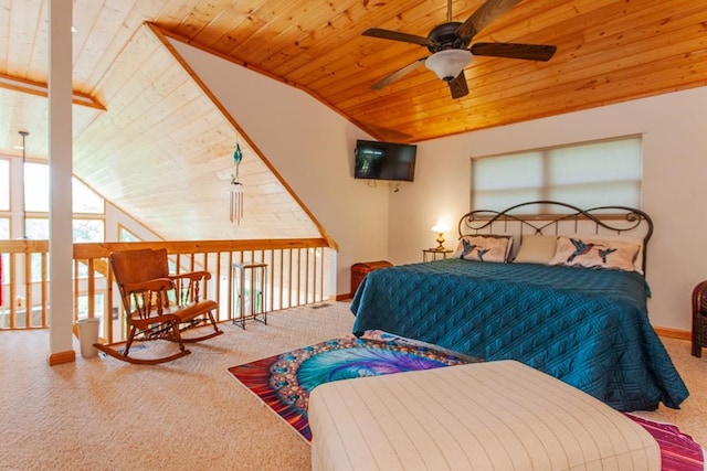 carpeted bedroom featuring ceiling fan, wood ceiling, and vaulted ceiling