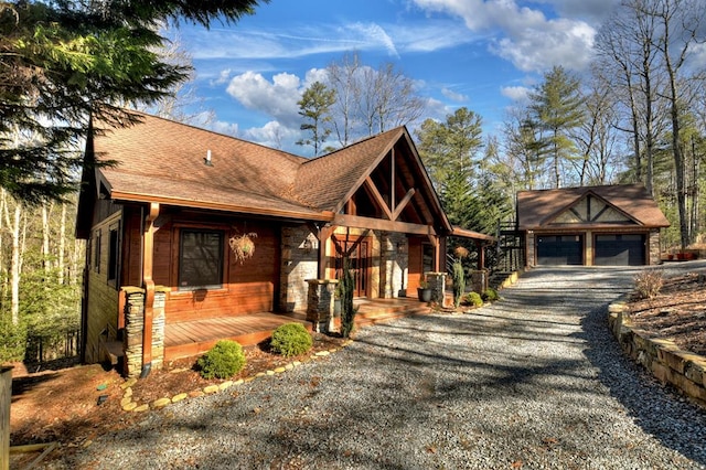 view of front of home with a garage and covered porch