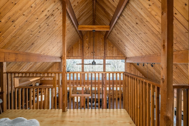 interior space with beam ceiling, high vaulted ceiling, and wooden ceiling