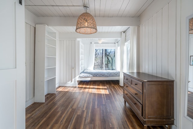 mudroom with beam ceiling, ceiling fan, and dark hardwood / wood-style flooring