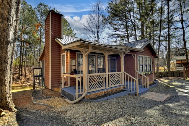 view of outbuilding with a porch