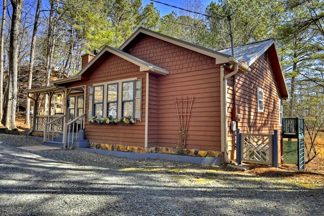 chalet / cabin with a chimney