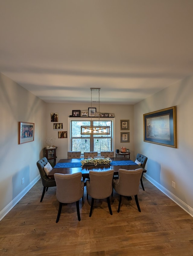 181 Charles Ln, Morganton, GA 30560 - dining space with wood finished floors, baseboards, and a chandelier