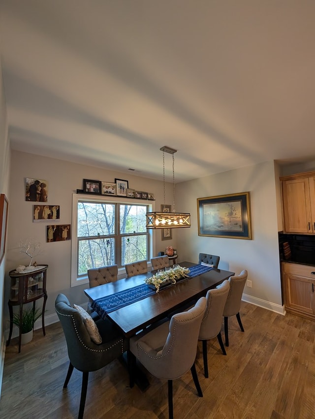 181 Charles Ln, Morganton, GA 30560 - dining space with dark wood-style floors and baseboards