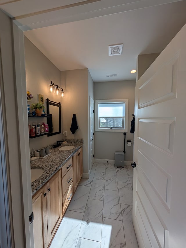 181 Charles Ln, Morganton, GA 30560 - bathroom with marble finish flooring, double vanity, baseboards, and recessed lighting