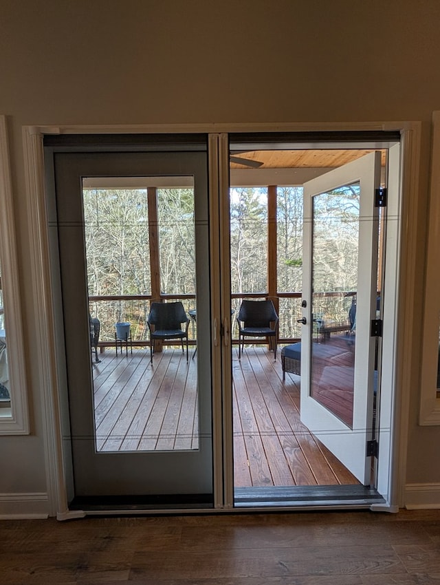 181 Charles Ln, Morganton, GA 30560 - doorway to outside featuring dark wood finished floors, plenty of natural light, and baseboards