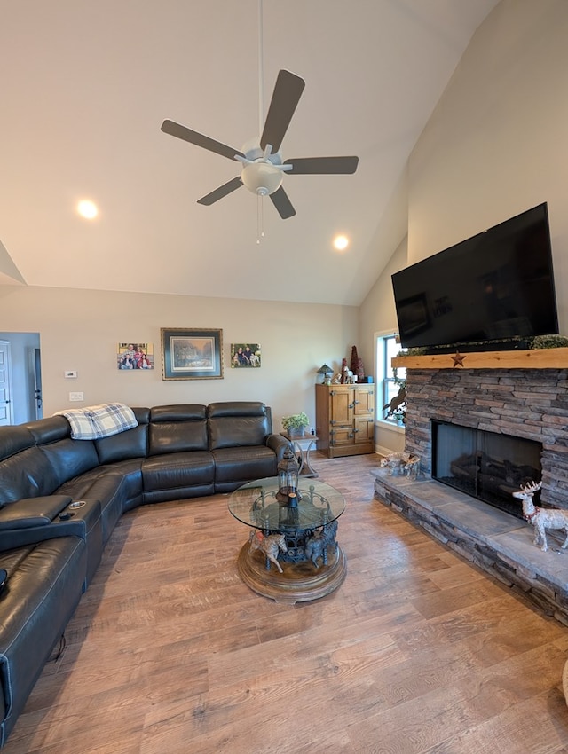 181 Charles Ln, Morganton, GA 30560 - living area featuring high vaulted ceiling, a ceiling fan, a stone fireplace, wood finished floors, and recessed lighting