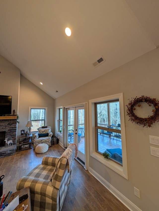 181 Charles Ln, Morganton, GA 30560 - living area with vaulted ceiling, dark wood finished floors, recessed lighting, baseboards, and french doors