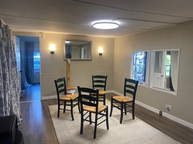 dining area featuring hardwood / wood-style flooring