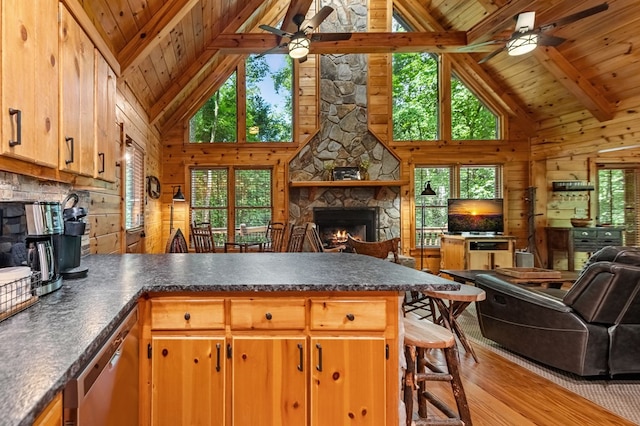 77 Old Covered Bridge Rd, Cherry Log, GA 30522 - kitchen featuring open floor plan, a ceiling fan, a peninsula, wood finished floors, and dark countertops
