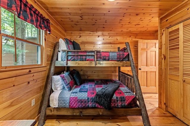 77 Old Covered Bridge Rd, Cherry Log, GA 30522 - bedroom with wooden walls, wood-type flooring, and wooden ceiling