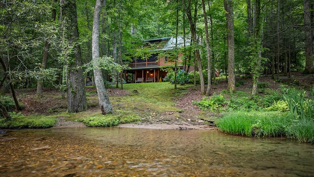 77 Old Covered Bridge Rd, Cherry Log, GA 30522 - view of yard featuring a forest view and a wooden deck