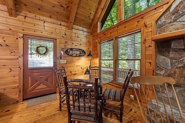 77 Old Covered Bridge Rd, Cherry Log, GA 30522 - dining room featuring light wood-style floors, healthy amount of natural light, wooden ceiling, and wood walls