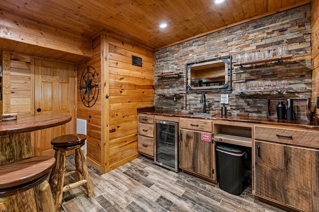77 Old Covered Bridge Rd, Cherry Log, GA 30522 - indoor bar with wine cooler, wood ceiling, wood walls, light wood finished floors, and recessed lighting