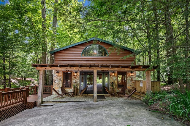 77 Old Covered Bridge Rd, Cherry Log, GA 30522 - back of property with a deck and stone siding