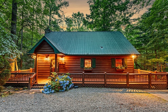 77 Old Covered Bridge Rd, Cherry Log, GA 30522 - chalet / cabin featuring a deck, a chimney, a metal roof, and view of scattered trees