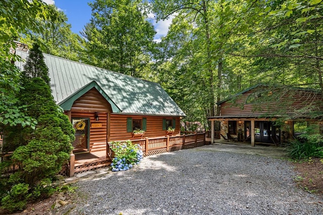 77 Old Covered Bridge Rd, Cherry Log, GA 30522 - view of side of property with a metal roof