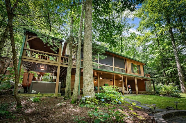 77 Old Covered Bridge Rd, Cherry Log, GA 30522 - back of property featuring a sunroom and a patio area
