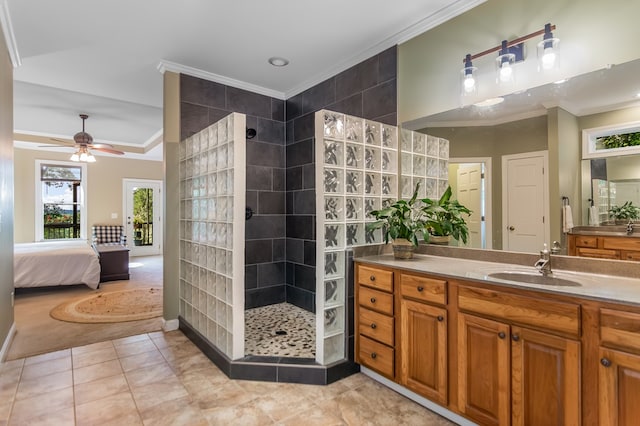 ensuite bathroom with a walk in shower, ornamental molding, ensuite bath, and vanity