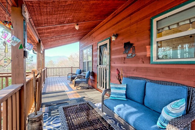 deck featuring an outdoor living space